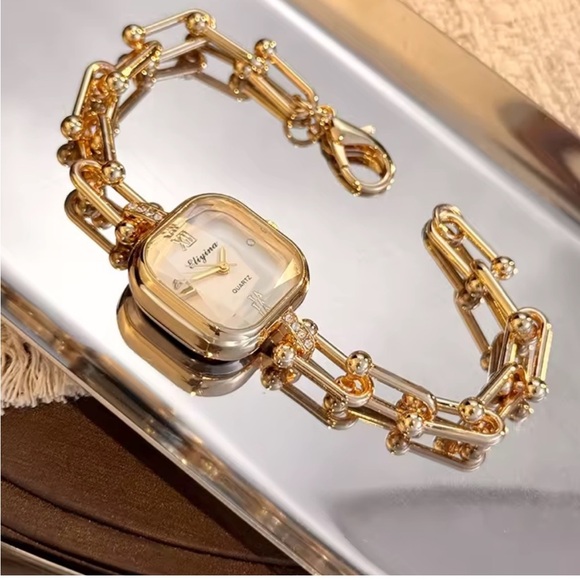 Anthropologie Accessories - Architectural Gold Link Watch